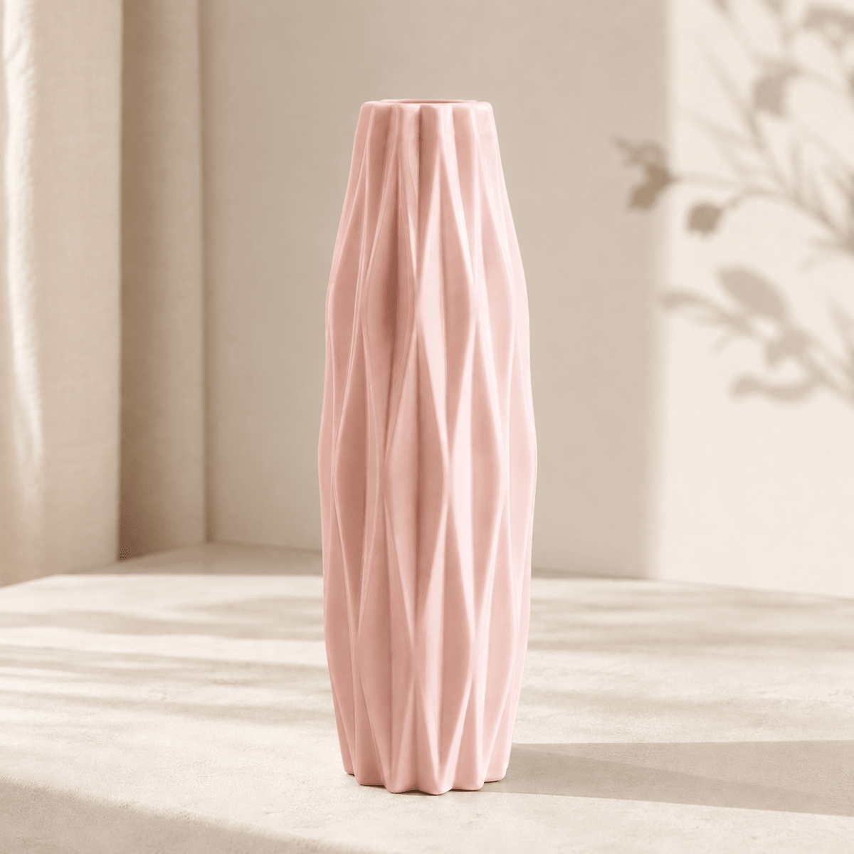 Facet - Diamond Pattern Faux Ceramic Vase — Pink in a clean warm-neutral product setting