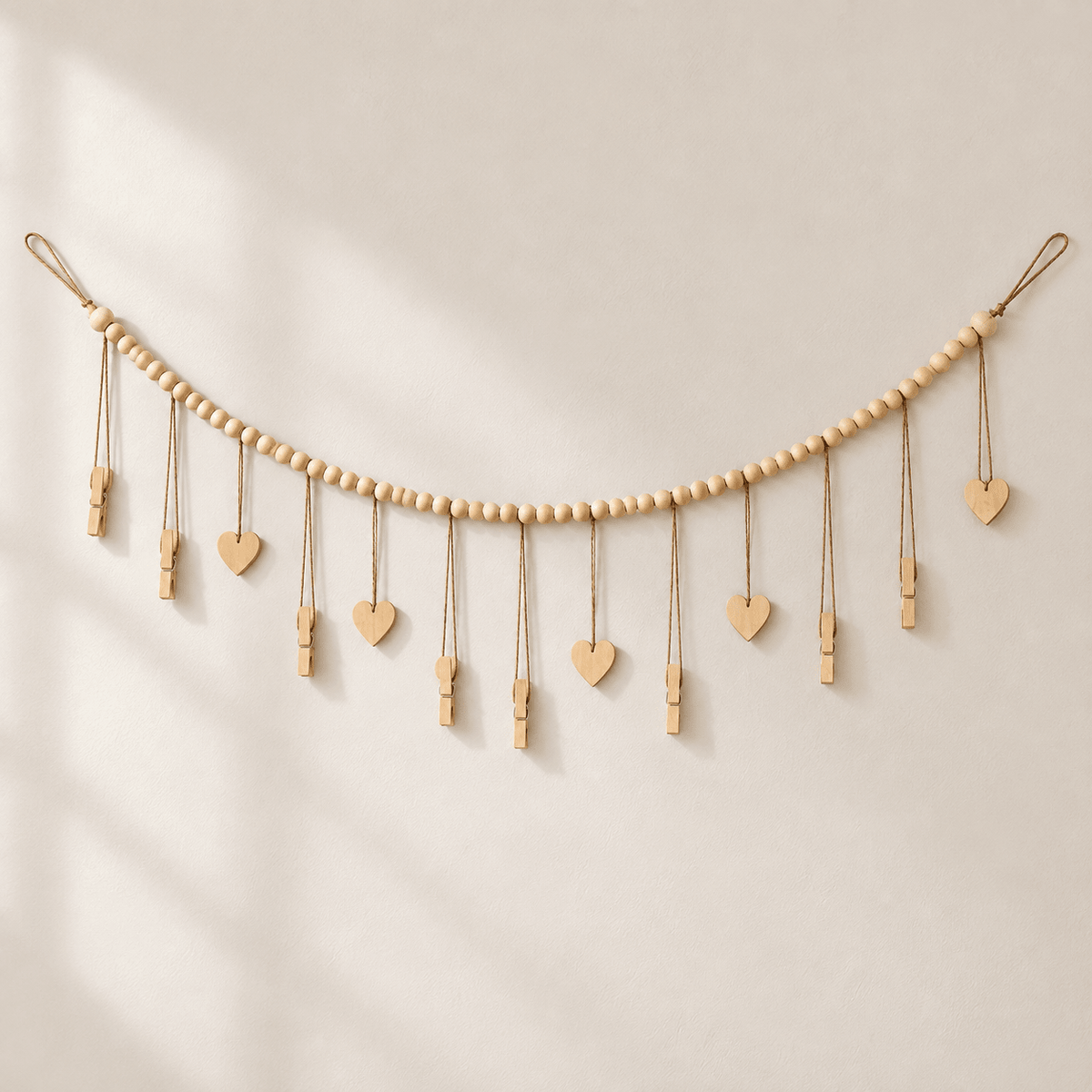 Luma - Boho Hanging Photo Display with Wood Bead — Solid Hearts in a clean warm-neutral product setting