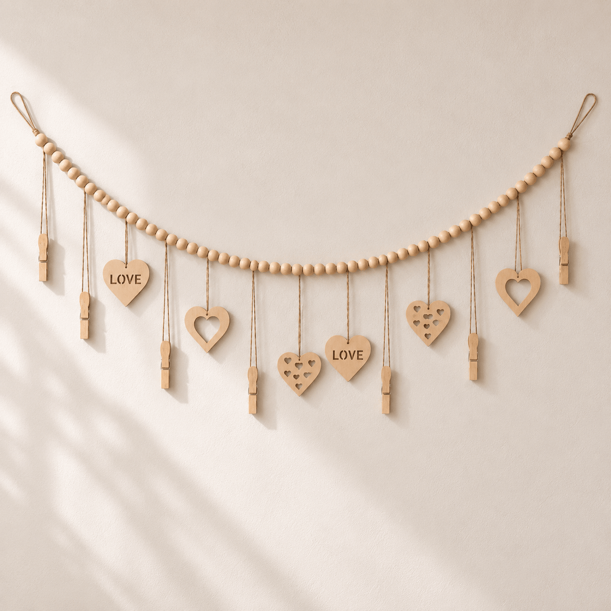 Luma - Boho Hanging Photo Display with Wood Bead — Styled Hearts in a clean warm-neutral product setting