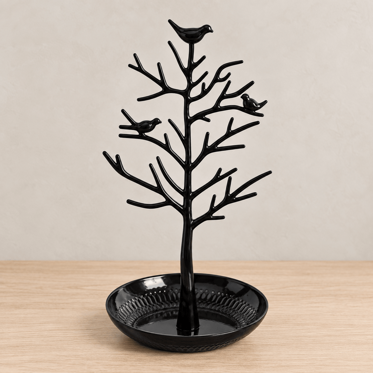 Rowan - Bird & Tree Jewelry Stand — Black in a clean warm-neutral product setting