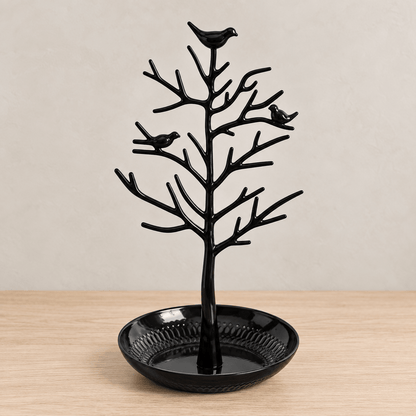 Rowan - Bird & Tree Jewelry Stand — Black in a clean warm-neutral product setting