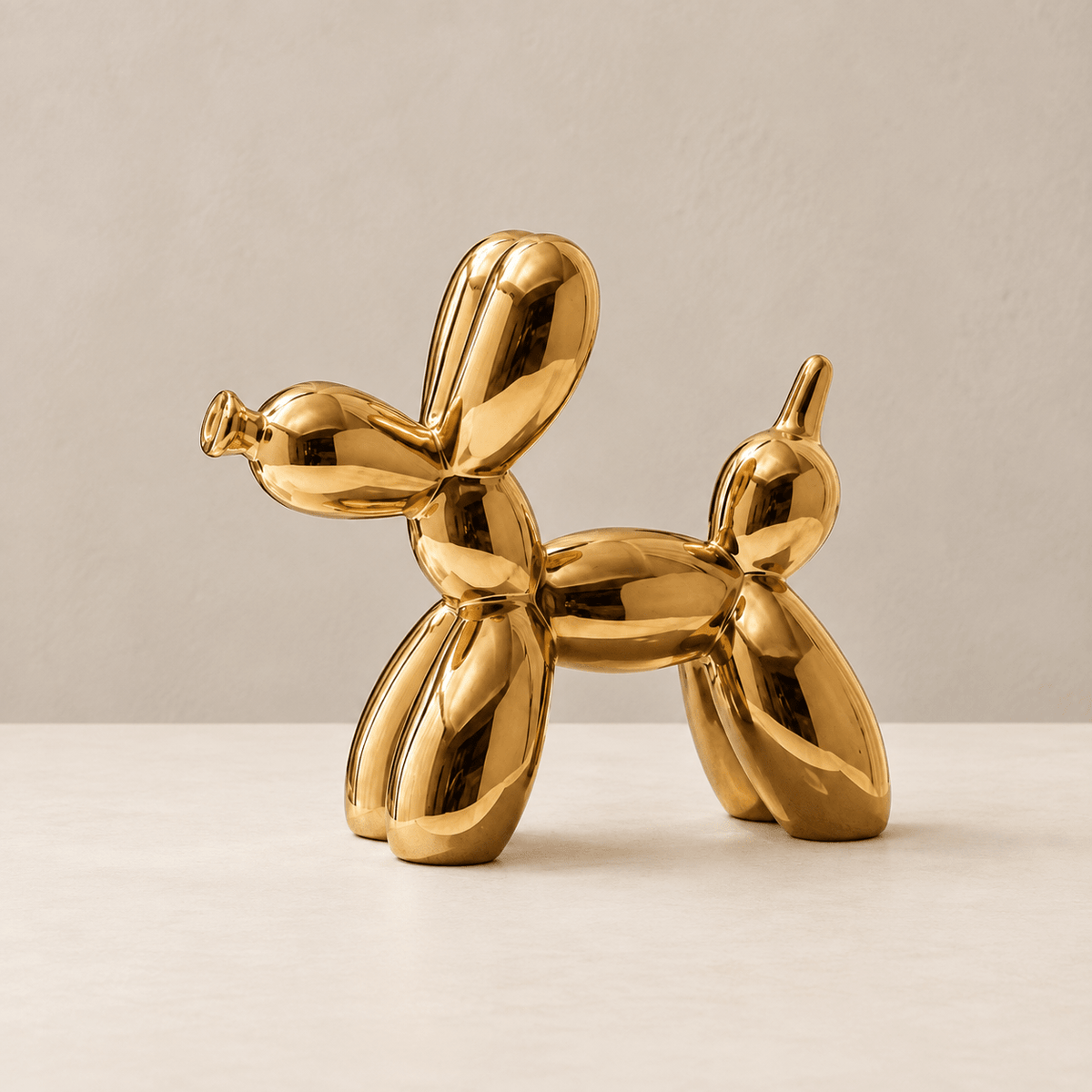 Art Deco Pup - Metallic Ceramic Balloon Dog Sculpture — Gold / Medium in a clean warm-neutral product setting