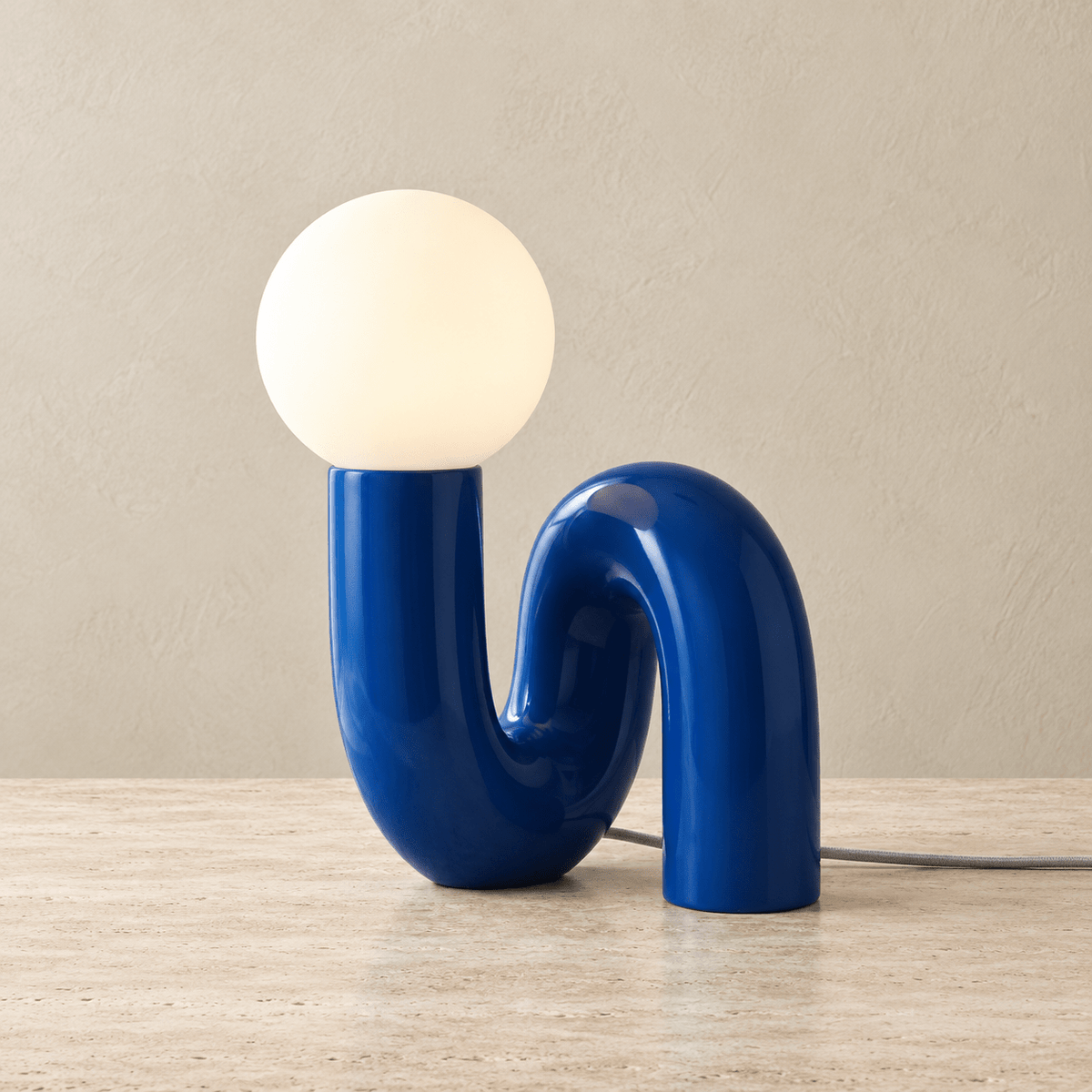 Solene - Globe Glass Table Lamp — Royal Blue / Us in a clean warm-neutral product setting