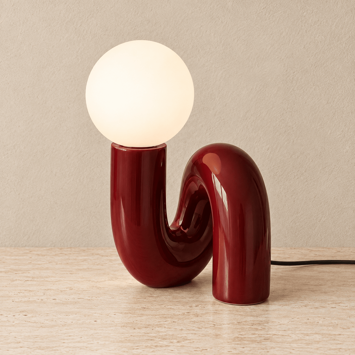 Solene - Globe Glass Table Lamp — Wine Red / Us in a clean warm-neutral product setting