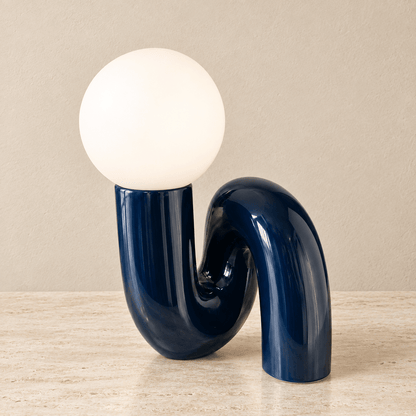Solene - Globe Glass Table Lamp — Deep Blue / Us in a clean warm-neutral product setting