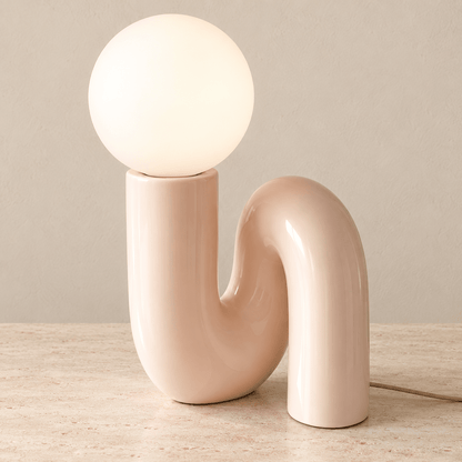 Solene - Globe Glass Table Lamp — Pink / Us in a clean warm-neutral product setting