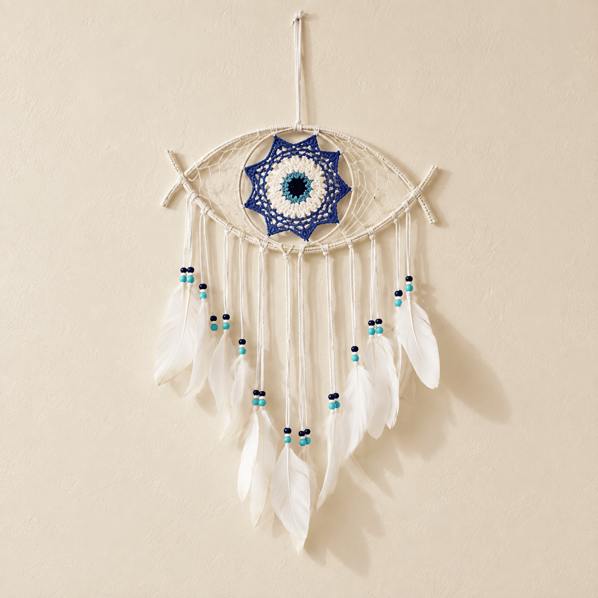 Nazar - Boho Evil Eye Dream Catcher — White in a clean warm-neutral product setting