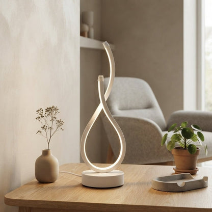 Luma Arc - Modern Dimmable LED Table Lamp in a clean warm-neutral product setting