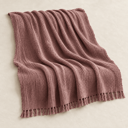 Mizu Fringe - Cotton Throw Blanket — Deep Purple / 51" × 67" in a clean warm-neutral product setting