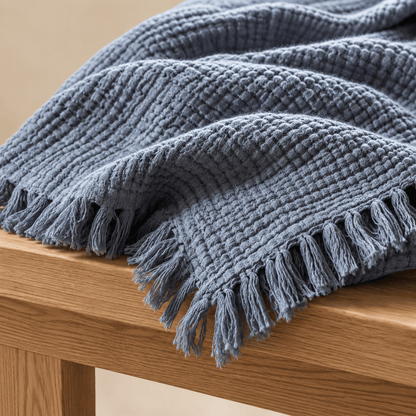 Mizu Fringe - Cotton Throw Blanket in a clean warm-neutral product setting