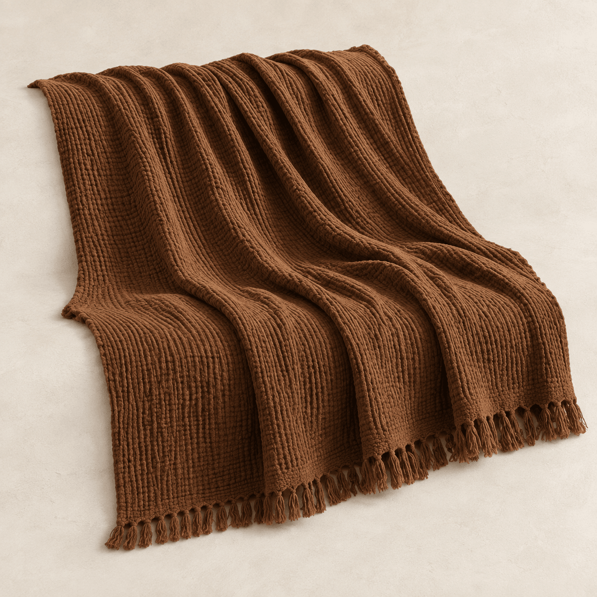Mizu Fringe - Cotton Throw Blanket — Brown / 51" × 67" in a clean warm-neutral product setting