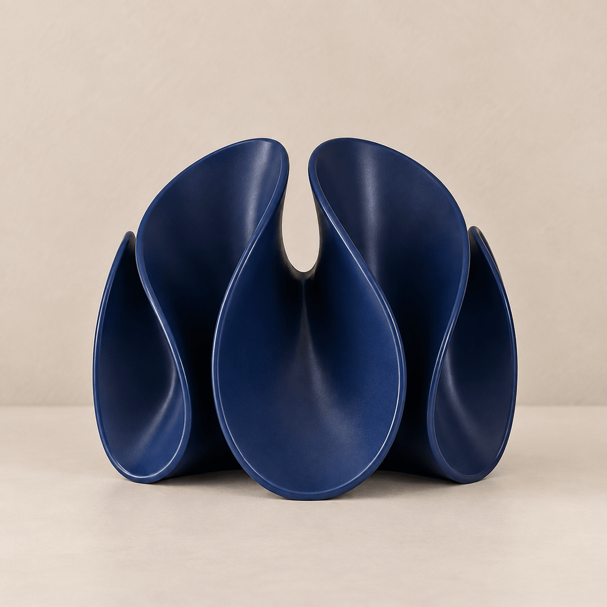 The Petal Flow - Abstract Resin Decorative Sculpture — Blue in a clean warm-neutral product setting